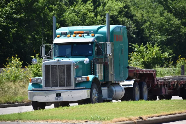 truck, 18 wheeler, flatbed, transport, industrial, heavy, worker, nature, car transportation, rig, equipment, machinery, development, blue, grass, forest, moving, service, heavy duty, cross country, driving, move, fast, grill, headlamp, exhaust. Moving company equipment brands, what each is known for, and how to trial one