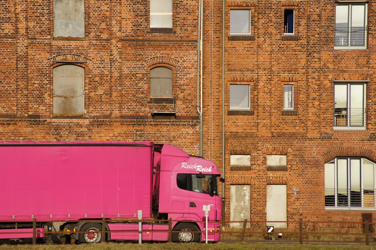 industry, port, dandruff, storage, flow, transport system, industrial landscape, port cranes, loading, harbor romance, harbor impressions, trucks, truck, transport, pink, brick, the atmosphere, window, old, building, facade, brick house, architecture, Bremen, Germany. Which moving company software deserves the subscription, explained
