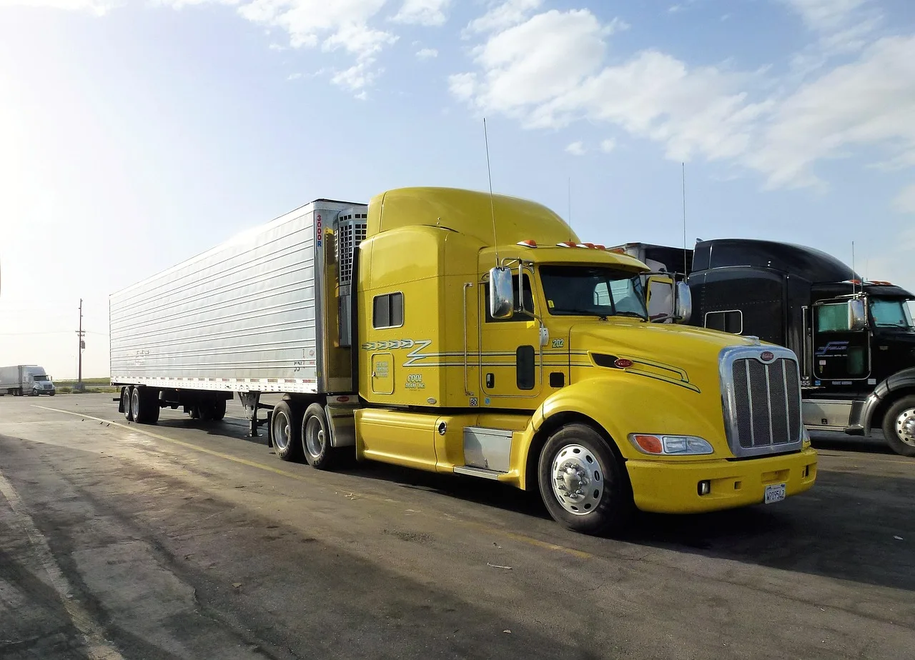 transport, automobile, truck, vehicle, trailer, yellow, car park, truck truck, truck american, truck, truck, truck, truck, truck, trailer, trailer. What matters most in profitable moving company services