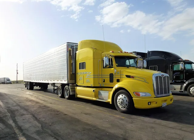 transport, automobile, truck, vehicle, trailer, yellow, car park, truck truck, truck american, truck, truck, truck, truck, truck, trailer, trailer. What matters most in profitable moving company services