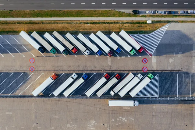 trucks, depot, warehouse, trucking industry, export, import, logistics, aerial view, transport, distribution, storage, storehouse, container, lorry, cargo, transit, poland, europe, trade, loading, aerial photography. Moving company recruitment and training explained